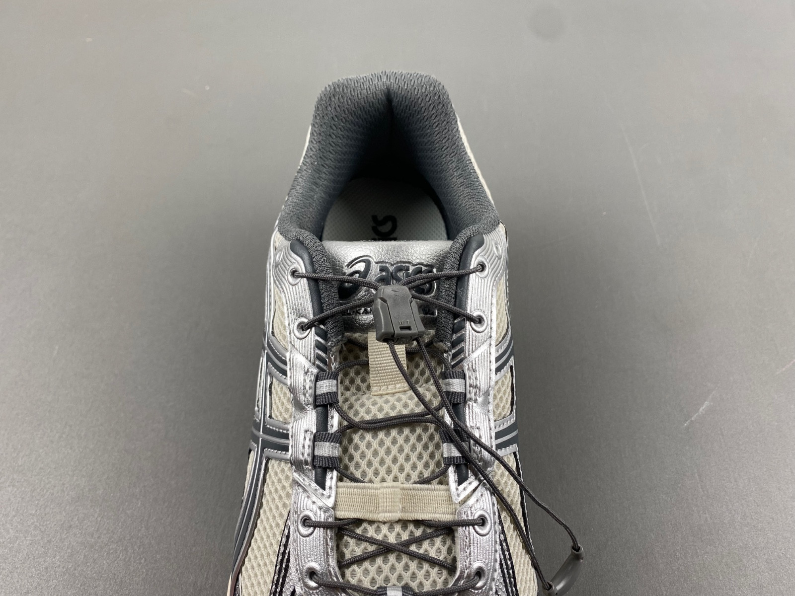 As*ic*s sneaker