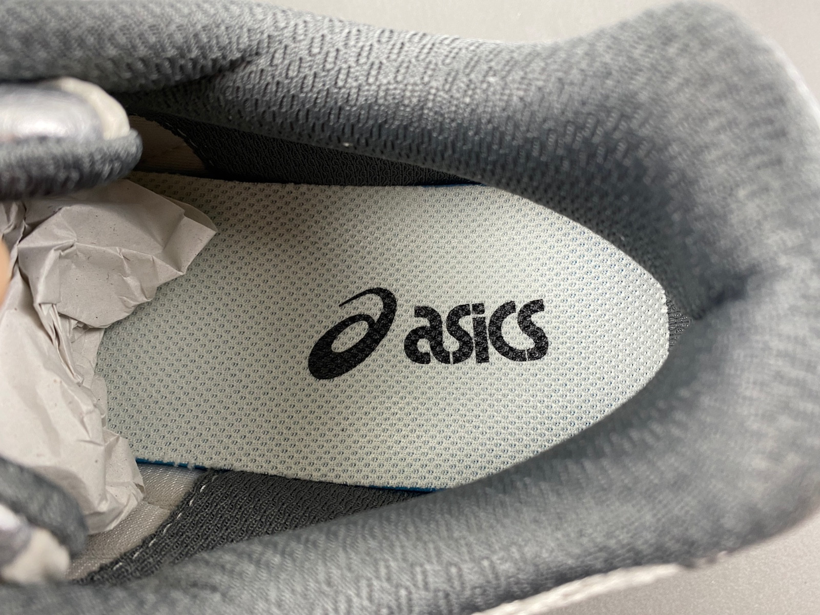 As*ic*s sneaker