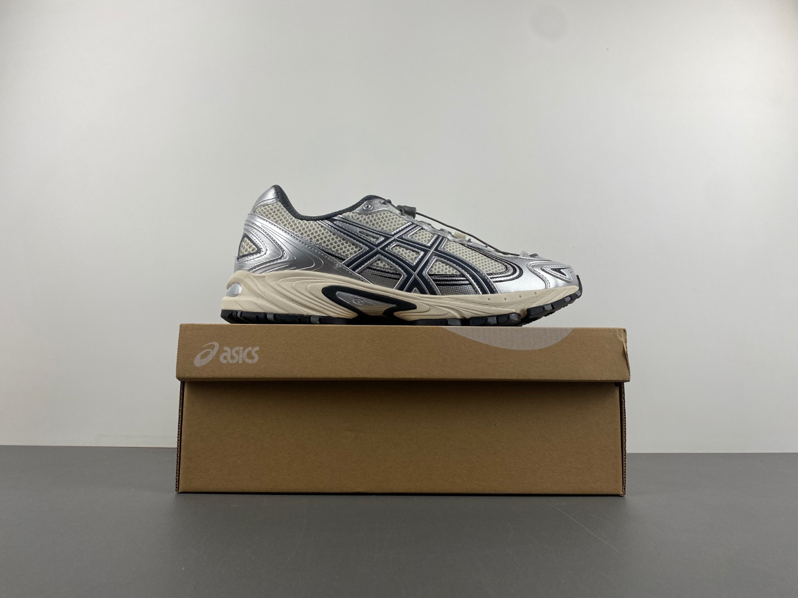 As*ic*s sneaker