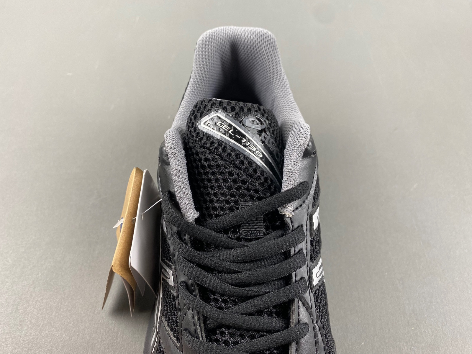 As*ic*s sneaker